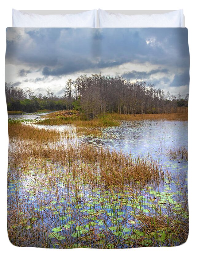 Marsh Duvet Cover featuring the photograph Lilypads in the Marsh Waters by Debra and Dave Vanderlaan
