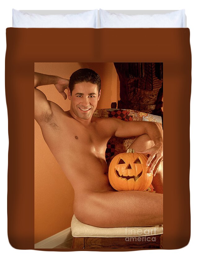 Young Duvet Cover featuring the photograph Male nude with Halloween Pumpkin by Gunther Allen