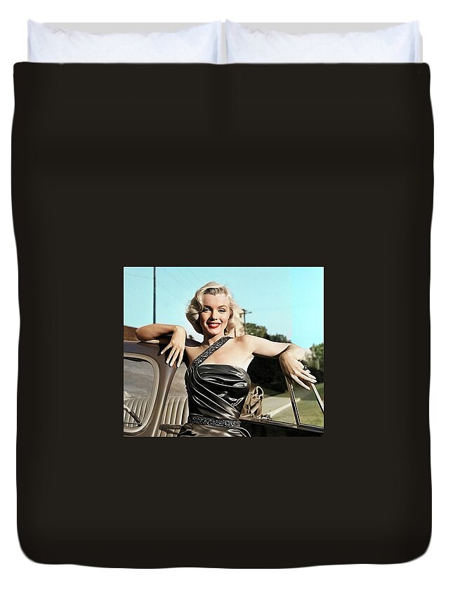 Marilyn Monroe Duvet Cover featuring the photograph Marilyn Monroe with car by Movie World Posters