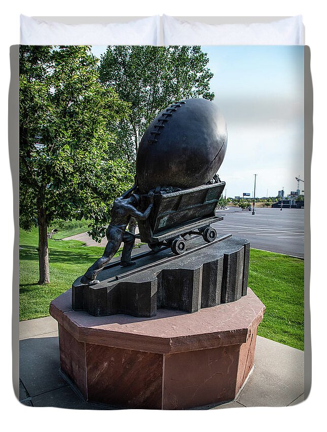 Denver Colorado Duvet Cover featuring the photograph Mining and football statue outside Empower Field at Mile High Stadium in Denver Colorado by Eldon McGraw