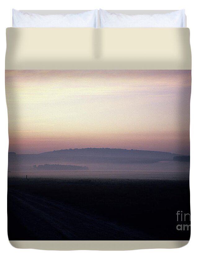 80025126 Duvet Cover featuring the photograph Morning Mist on Salisbury Plain by Patrick G Haynes
