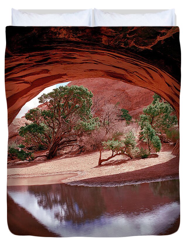 Arches Duvet Cover featuring the photograph Navajo Arch Reflection by Tom Daniel