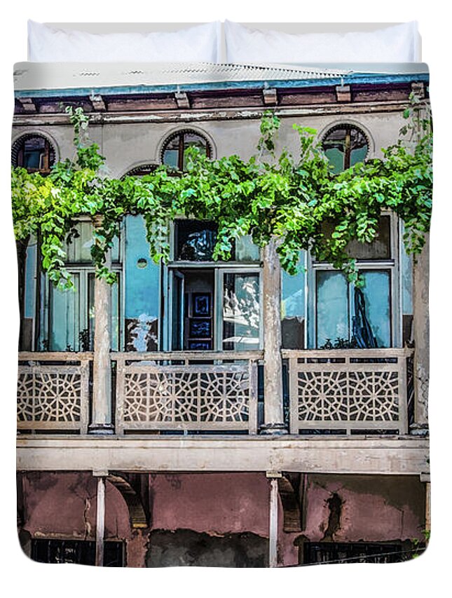 Tiflis Duvet Cover featuring the photograph Old ornate grungy house in Tbilisi Georgia covered with grape vines by Susan Vineyard