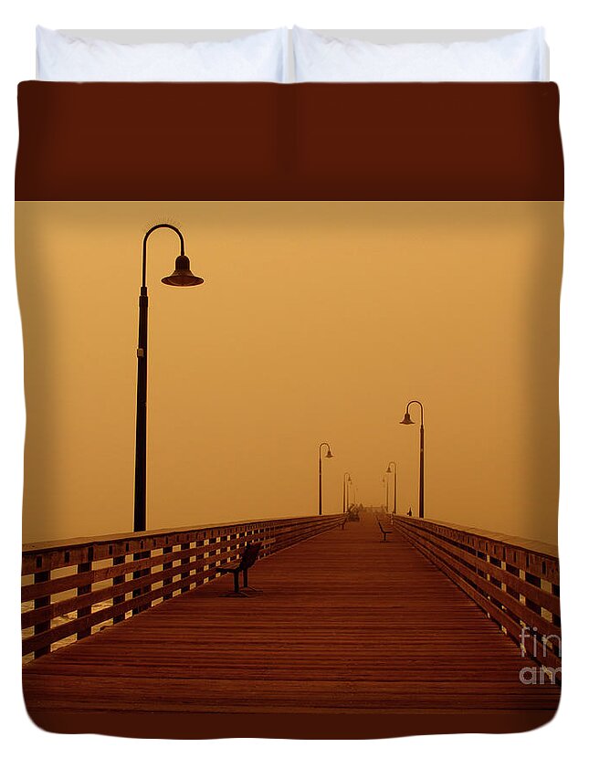 Smoke Duvet Cover featuring the photograph Pier Engulfed in Smoky Sky by Katherine Erickson
