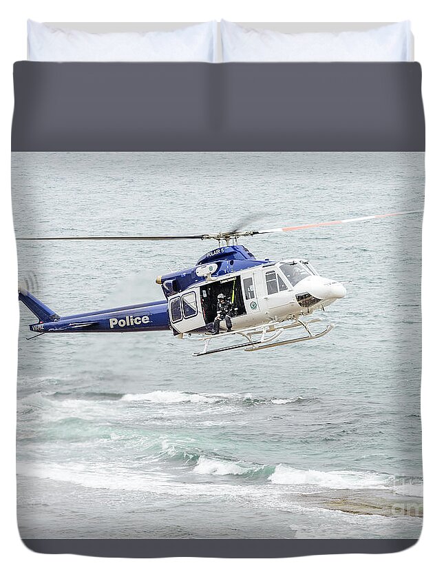 Ocean Duvet Cover featuring the photograph Police Chopper Mission by Werner Padarin