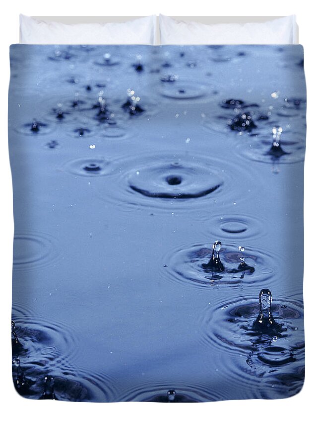 Rain Duvet Cover featuring the photograph Rain Drops on Water by Warren Photographic