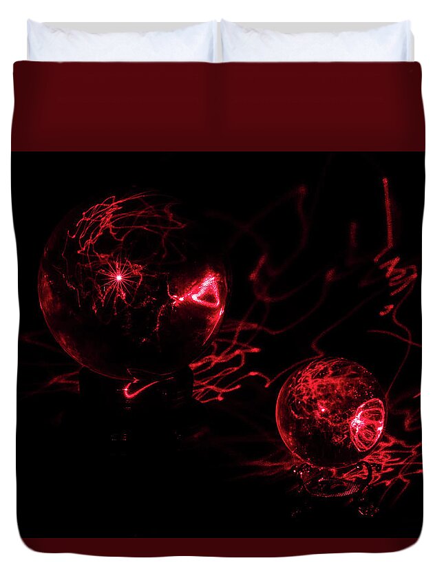 North Carolina (nc) Duvet Cover featuring the photograph Red Laser Interacts with Two Crystal Balls by Charles Floyd
