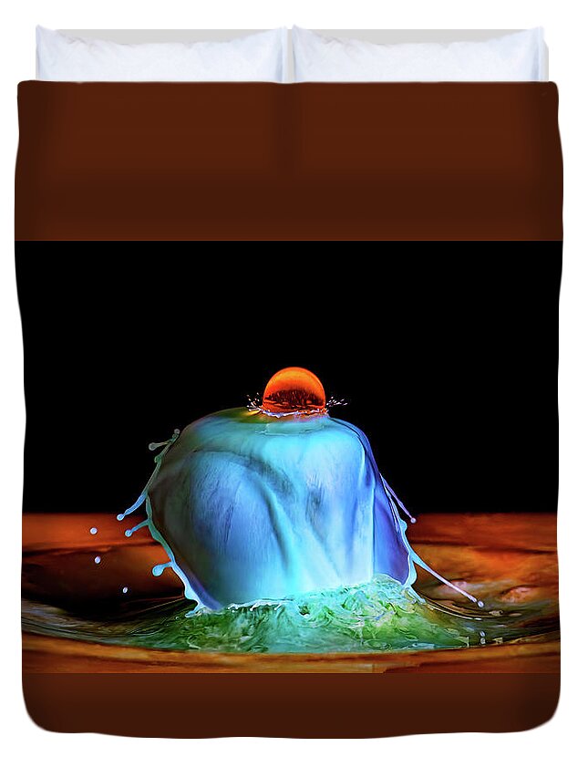 Water Drop Collision Duvet Cover featuring the photograph Red Moon Over a Waterfall by Michael McKenney