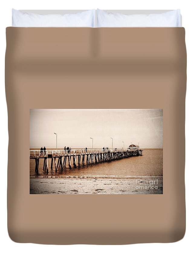 Jetty Duvet Cover featuring the photograph Retro grunge vintage style sepia people on jetty pier boardwalk. by Milleflore Images