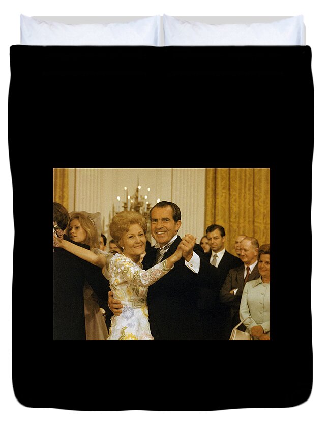 President Nixon Duvet Cover featuring the photograph Richard and Pat Nixon Dancing At The White House - 1971 by War Is Hell Store