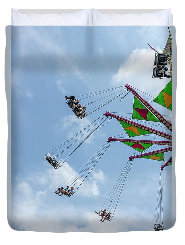 2018 Duvet Cover featuring the photograph Riders on a swing carousel at a county fair by William Kuta