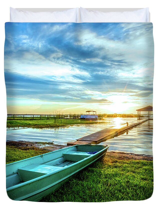Docks Duvet Cover featuring the photograph Rowboat at the Water's Edge by Debra and Dave Vanderlaan