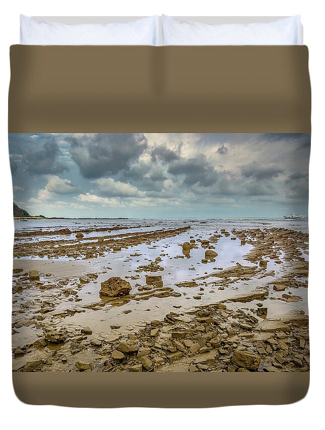 Shore Duvet Cover featuring the photograph Rugged shoreline by Henri Leduc