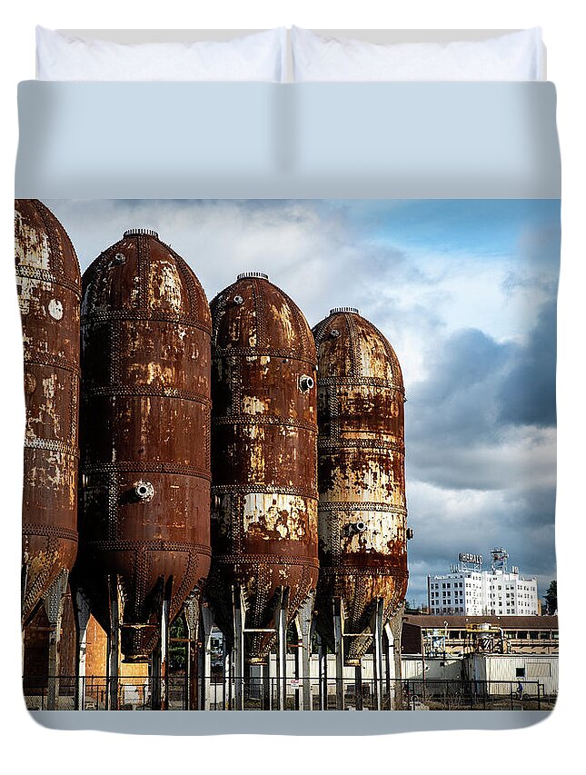 Rusty Tanks And White Herald Building Duvet Cover featuring the photograph Rusty Tanks and White Herald Building by Tom Cochran