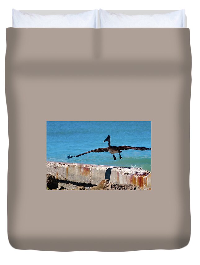 Pelican Duvet Cover featuring the photograph Smooth Landing by Vicky Edgerly
