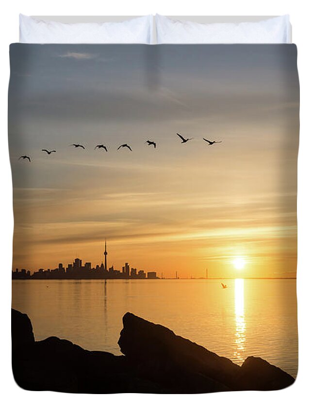 Splendid Sunrise Duvet Cover featuring the photograph Splendid Sunrise with Birds - Toronto Skyline with Free Flying Cormorants by Georgia Mizuleva
