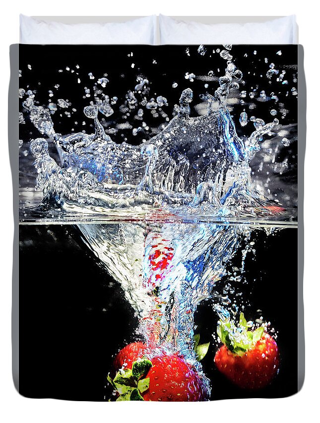 Water Duvet Cover featuring the photograph Strawberry Splashdown by Jon Glaser