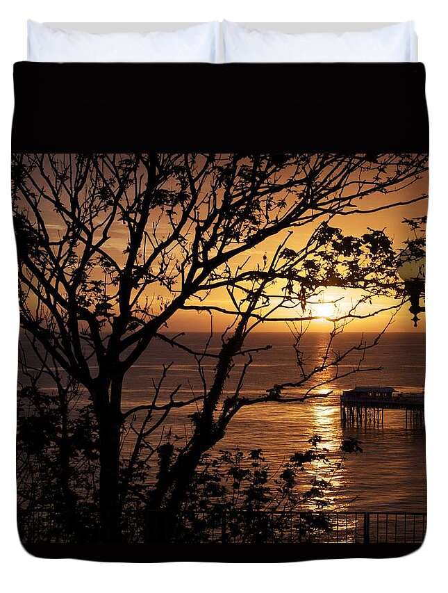 Sun Duvet Cover featuring the photograph Sunrise over Llandudno pier by Christopher Rowlands