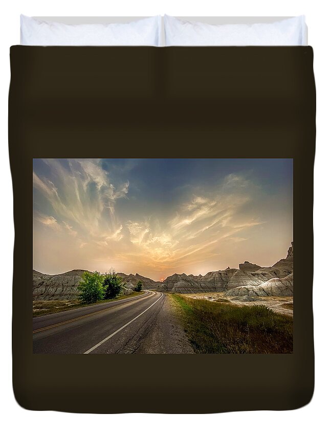 National Park Duvet Cover featuring the photograph Sunset at Badlands National Park by Susan Rydberg