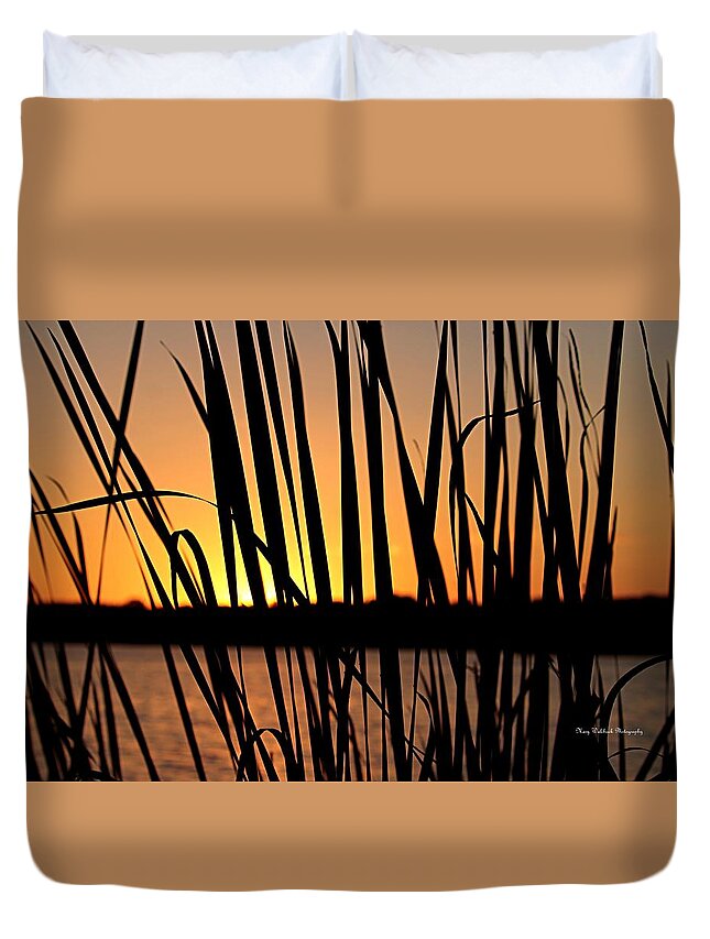 Sunset Duvet Cover featuring the photograph Sunset Through the Reeds by Mary Walchuck
