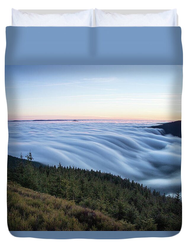 Courage Duvet Cover featuring the photograph Sunset with floating blue waves of clouds by Vaclav Sonnek