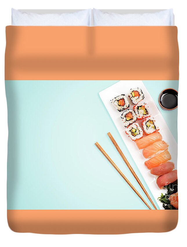 Sushi Duvet Cover featuring the photograph Sushi rolls set on blue by Jelena Jovanovic