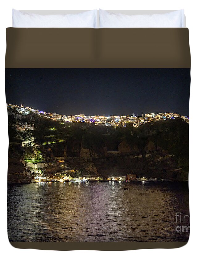 Night Duvet Cover featuring the photograph the city of Fira, Santorini, Greece at night l6 by Ohad Shahar