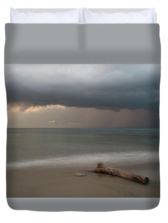 Storm Duvet Cover featuring the photograph The coming of the storm from ocean by Michalakis Ppalis