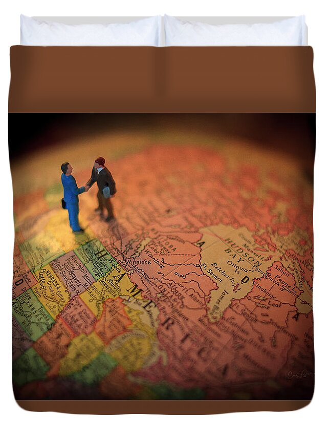 World Duvet Cover featuring the photograph The Handshake by Craig J Satterlee