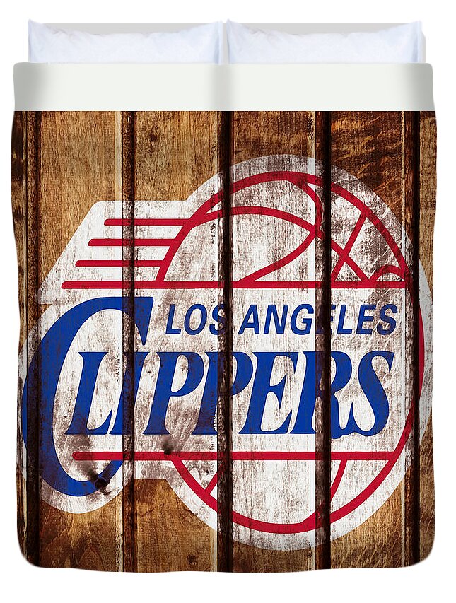 Los Angeles Clippers Duvet Cover featuring the mixed media The Los Angeles Clippers by Brian Reaves