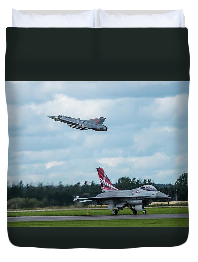 Take Off Duvet Cover featuring the photograph The retired Swedish J35 Draken take off and the taxing Danish F16 Fighting Falcon by Torbjorn Swenelius
