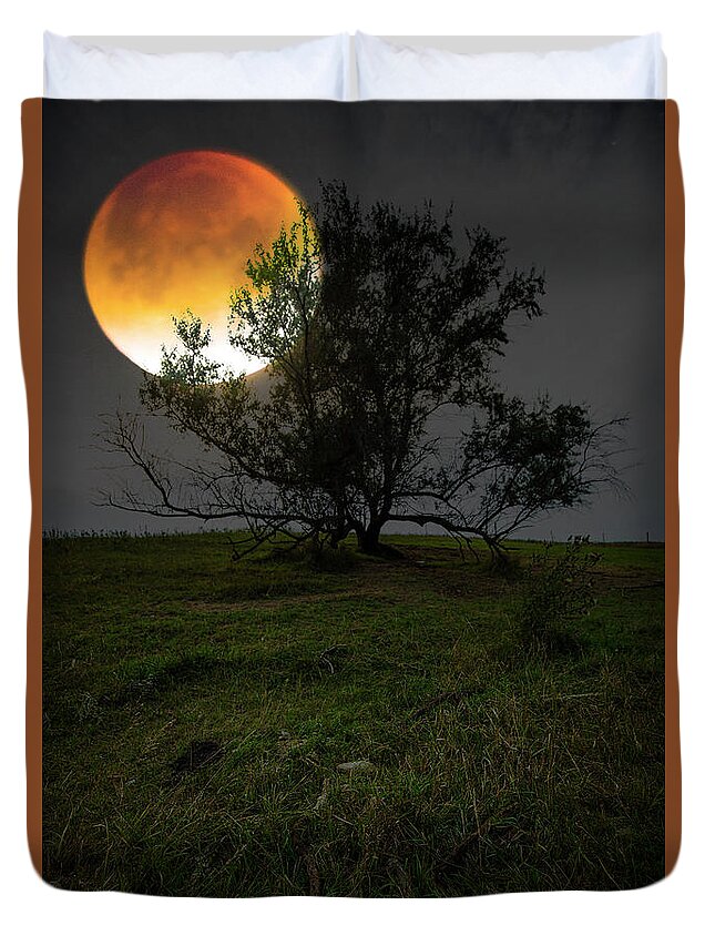 Blood Moon Duvet Cover featuring the photograph There's Blood On The Moon by Aaron J Groen