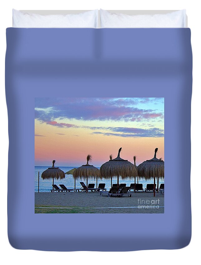 Andalusia Duvet Cover featuring the photograph Tiki Umbrellas and Sunsets by Yvonne M Smith