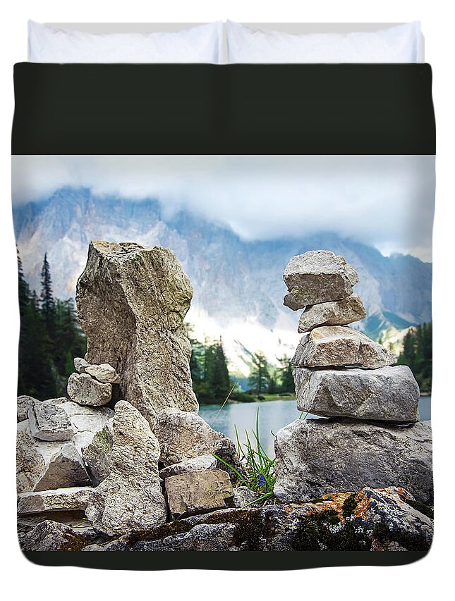 Two Duvet Cover featuring the photograph Two stone towers as route markers. by Bernhard Schaffer