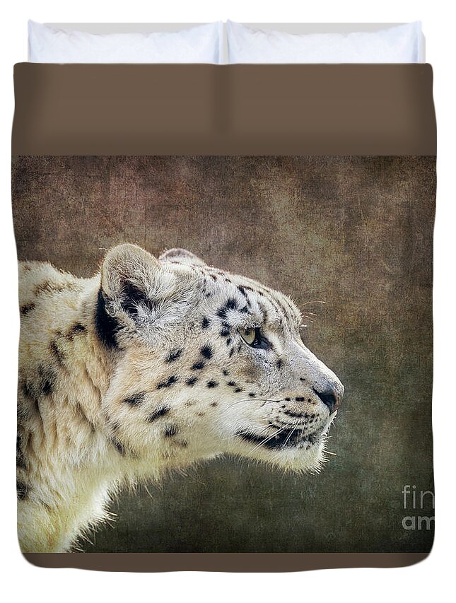 Animal Duvet Cover featuring the photograph Watchful and alert adult snow leopard, Panthera uncia, side prof by Jane Rix