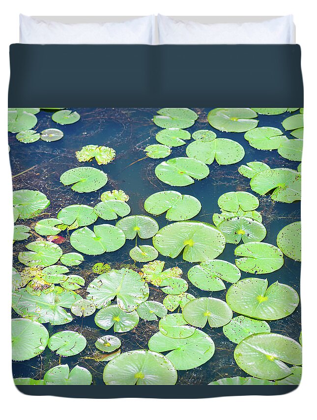 Water Duvet Cover featuring the photograph Water lily leaves by Aarthi Arunkumar