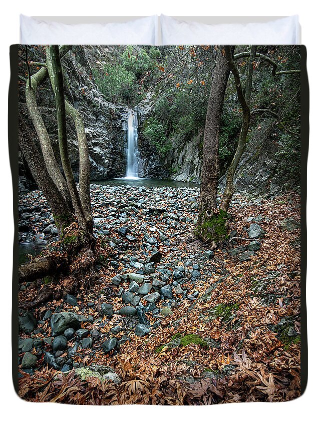 Autumn Landscape Duvet Cover featuring the photograph Waterfall splashing in the canyon in autumn. by Michalakis Ppalis
