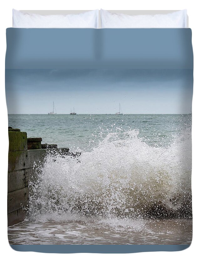 Eastbourne Duvet Cover featuring the photograph Wave splash by Andrew Lalchan