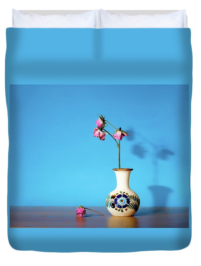 Still Life Duvet Cover featuring the photograph Wilted roses against blue by Alessandra RC
