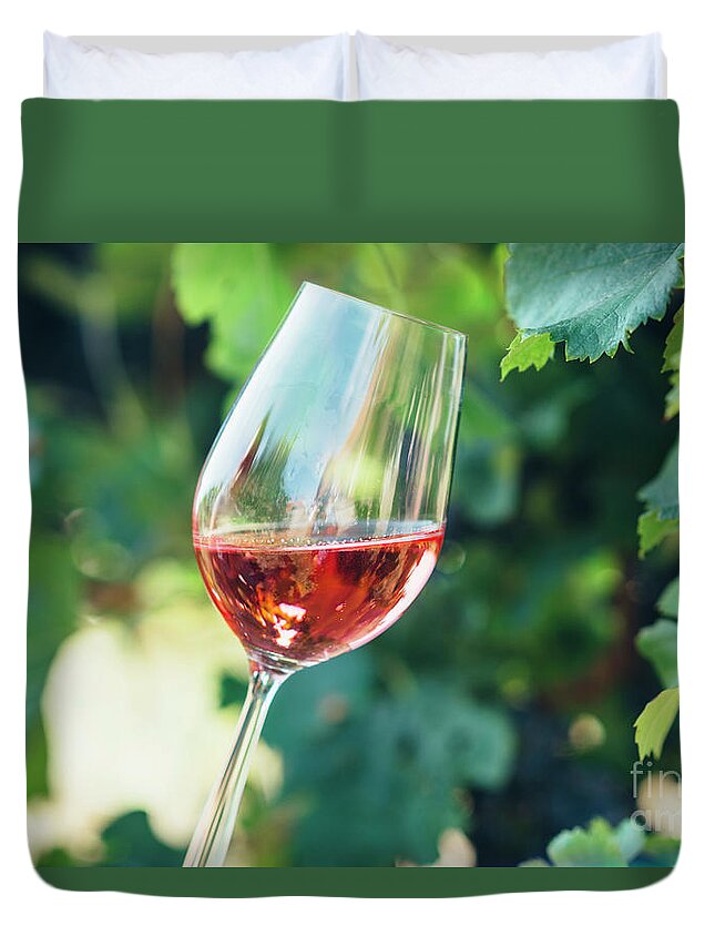 Wine Duvet Cover featuring the photograph Wine tasting in outdoor winery. by Jelena Jovanovic