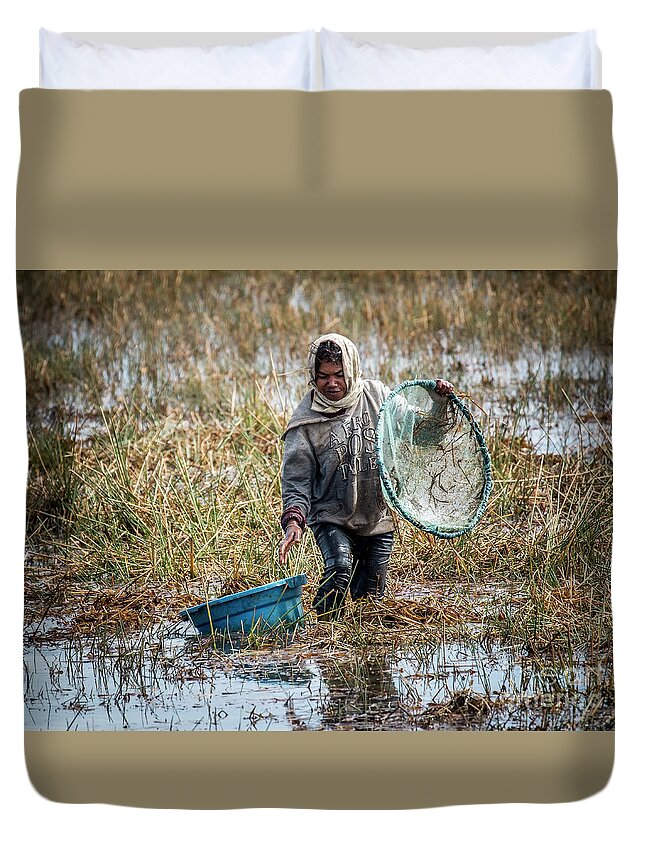 Madagascar Duvet Cover featuring the photograph Woman catching fish in a paddyfield - 2 by Claudio Maioli