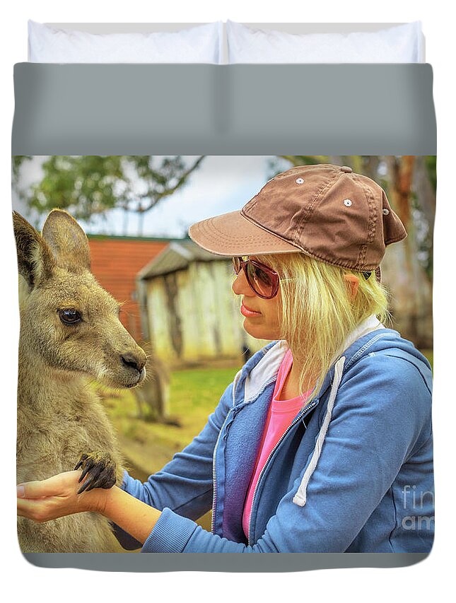Kangaroos Duvet Cover featuring the photograph Woman with kangaroo by Benny Marty