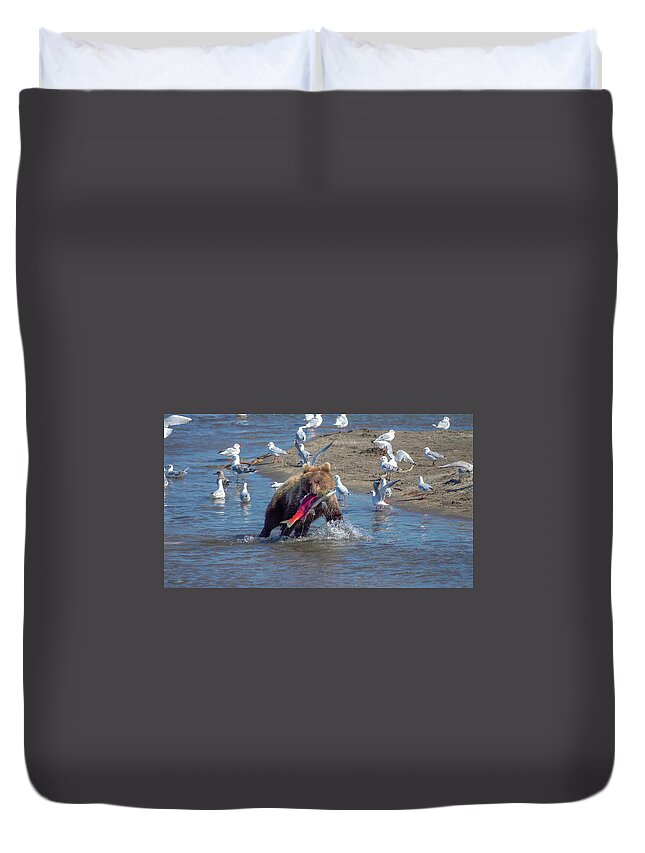 Bear Duvet Cover featuring the photograph Young fishing brown bear with salmon by Mikhail Kokhanchikov