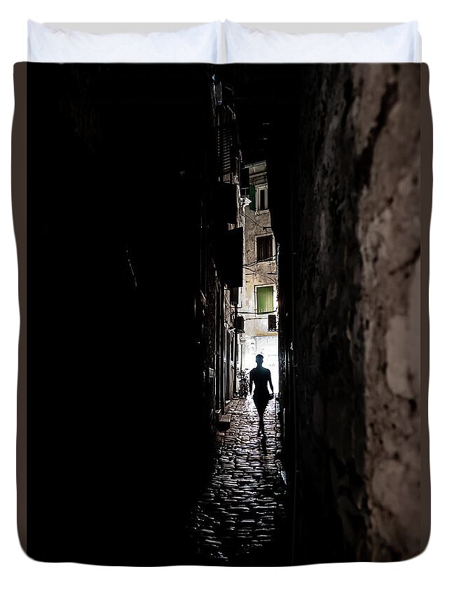  Duvet Cover featuring the photograph Young Woman Walks Alone Through Spooky Narrow Abandoned Alley In The Night by Andreas Berthold