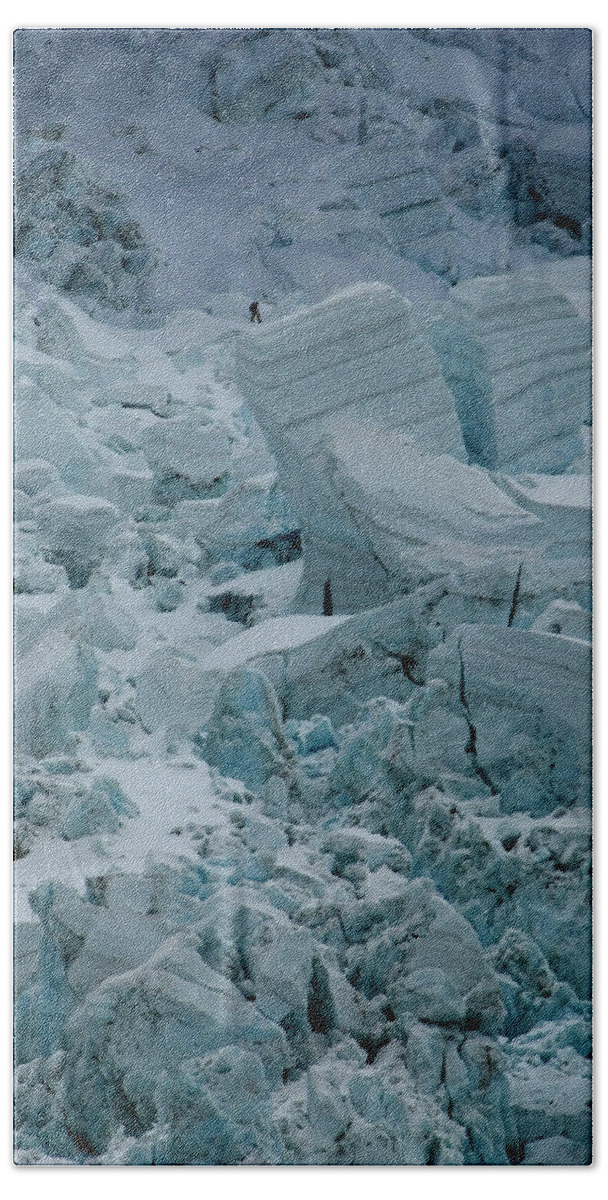000 Feet Hand Towel featuring the photograph Climber Negotiating Everests Khumbu #1 by Peter McBride