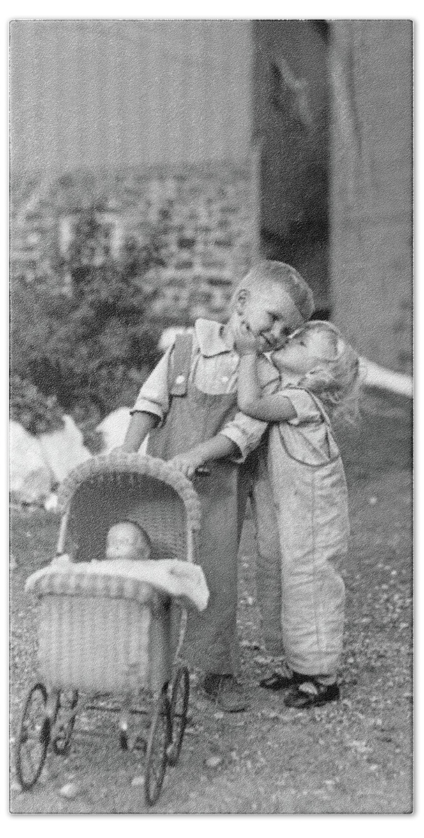 Photography Hand Towel featuring the photograph 1930s Little Girl Kissing Boy Pushing by Vintage Images