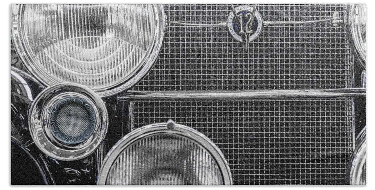 1935 Hand Towel featuring the photograph 1935 Cadillac V12 Roadster Emblem and Headlights 1 by Ron Pate