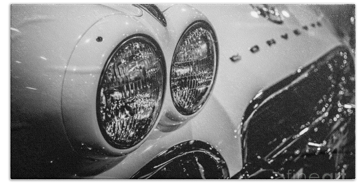 1950's Bath Towel featuring the photograph 1950's Chevrolet Corvette C1 in Black and White by Paul Velgos