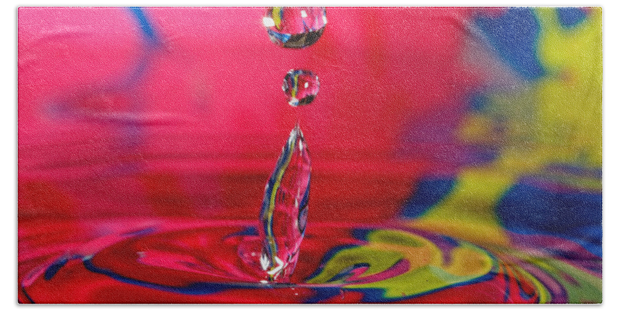  Abstract Hand Towel featuring the photograph Colorful Water Drop #2 by Peter Lakomy