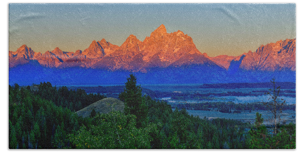 Tetons Bath Towel featuring the photograph Alpenglow Across The Valley by Greg Norrell